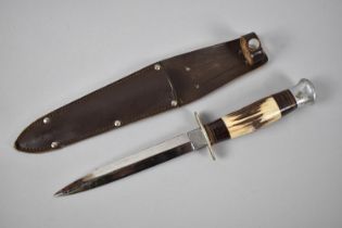 A Mid 20th Century Stiletto Blade Knife by William Rodgers in Leather Scabbard