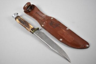 A Mid 20th Century Bone Handled Hunting Knife by W R Fagan, with Leather Scabbard