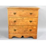 An Edwardian Stained Pine Bedroom Chest of Three Long Drawers, 76ms Wide