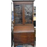 A Mid 20th Century Mahogany Astragal Glazed Bureau Bookcase with Fall Front to Fitted Interior, Four