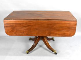 A Late 19th Century Drop Leaf Table on Centre Pedestal with Brass Casters, End Drawee Matched by