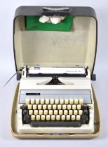 A Vintage Cased Adler Gabrielle 25 Manual Portable Typewriter