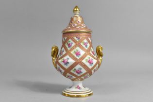 A Porcelain Lidded Pedestal Vase with Twin Handles Decorated with Pink and Gilt Insets Bordering