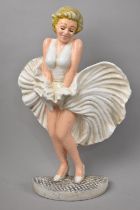 A Cold Painted Cast Iron Doorstop in the Form of Marilyn Monroe, 33.5 cm high