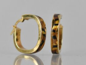 A Pair of 9ct Gold and Enamelled Hoop Earrings, Central Wavy Channel decorated in Black, Gold and