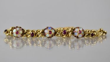 A Ruby, Opal and Gold Metal Bracelet comprising Three Raised Jewelled Roundels, Each with Central