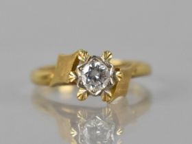An 18ct Gold and Diamond Solitaire Ring, Fancy Star Shaped Illusion Set Round Cut Diamond