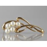 A 9ct Gold, Pearl and Diamond Brooch, Five Pearls Measuring 5.5mm Diameter and Four Claw White Metal