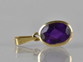 A 14ct Gold Mounted Oval Cut Amethyst Pendant, 11mm by 8mm, Colet Set and Stamped 585 to Bale, Total