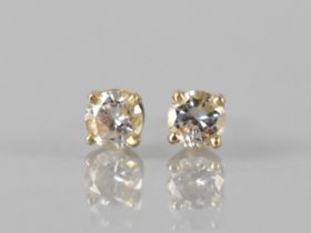 A Pair of Diamond Stud Earrings, Round Brilliant Cut Stones Measuring 4mm Diameter, Set in Four