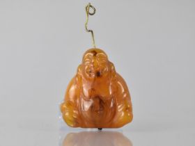 A Vintage Carved Amber Study of a Seated Buddha, 38mm High, 11.2gms
