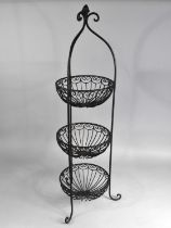 A Wrought Metal Three Tier Plant Stand, 92cm high