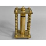 An Early 20th Century Brass Coin Store of Cylindrical Form and Set in Rectangular Stand, 22cms High