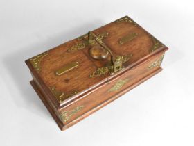 An Edwardian Oak and Brass Two Division Cigar and Cigarette Box, Top with Attached Match Striker and