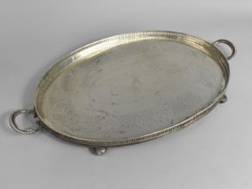 An Edwardian Oval Two Handled Silver Plated Tray with Galleried Border, 63cms Wide