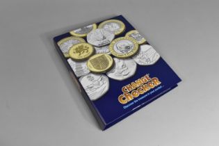 A Change Checker Ring Binder Containing Various British and Foreign Mint and Circulated Coins