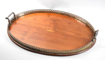 An Edwardian Mahogany and Silver Plate Galleried Two Handled Oval Tray, 51cms Wide