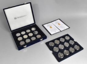 A Cased Queen Elizabeth Royal Crown Collection by Westminster Mint, 24 Coins with Certificates of