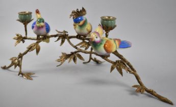 A Gilt Bronze and Porcelain Two Branch Candelabra in the Form of Parrots Perched on Branches,