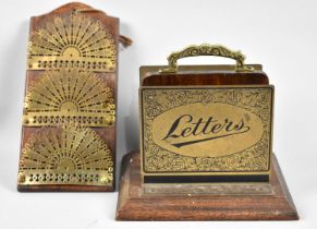 An Edwardian Oak and Brass Two Division Letter Rack together with a Wall Hanging, Pierced Brass