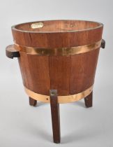 A Copper Banded Shrub Tub on Three Feet with Two Carrying Handles by Trevis Smith Ltd, 28cms