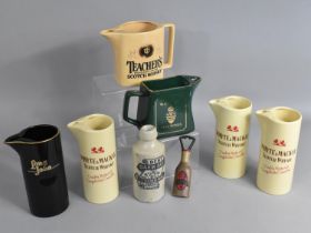 A Collection of Reproduction Advertising Whisky Jugs Together with a Vintage 'Best Barm Beer' Bottle