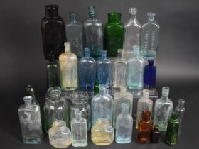 A Collection of Various Vintage Glass Bottles
