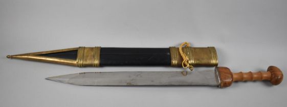A Replica Wooden Handled Short Sword with Brass Mounted Leather Scabbard, Overall Length, 82cms