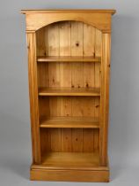 A Modern Pine Three Shelf Open Bookcase, 61cms Wide and 120cms High