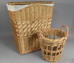 A Wicker Laundry Basket Together with a Wicker Basket and Pair of Lamps