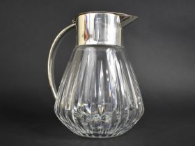 A Large Heavy Glass and Silver Plated Jug with Inner Ice Chamber 23cm high