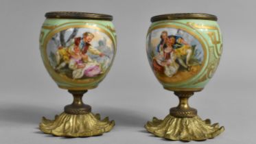 A Pair of Gilt Metal Mounted Globular Sevres Porcelain Pots with Lovers Cartouches on Pale Green