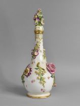 A 19th Century Coalbrookdale Encrusted Bottle, 32cm high, Condition Issues