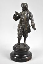 A Bronzed Spelter Figure of Gent with Book, 28cms High