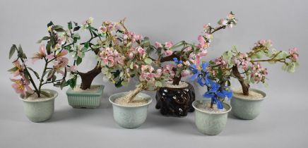 A Collection of Various Reproduction Oriental Flower Ornaments