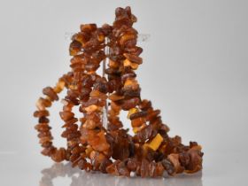 A Long Amber Chip Necklace, Approx 130cms, 77.5gms