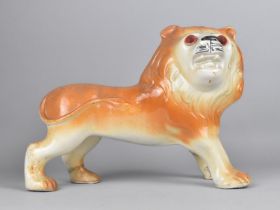 A Large Ceramic Study of a Lion, 26cm high