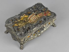 A Mid 20th Century Japanese Musical Jewellery Box, Hinged Lid Decorated in Deep Relief with Dragons,