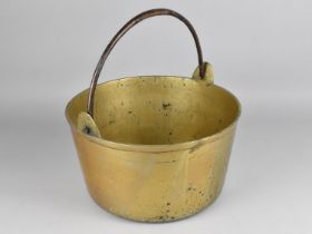 A Late 19th/Early 20th Century Brass Circular Jam Kettle with Steel Loop Handle, 34cms Diameter