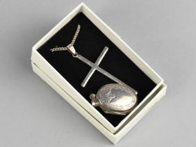 A Silver Crucifix Pendant on Silver Chain Together with a Silver Locket