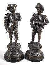 A Pair of French Bronzed Spelter Figures, Musketeers on Circular Socles, 44cms High