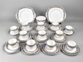 An Art Deco Royal Albert Tea Set Decorated with Egyptian Revival Horus Trim to Comprise Twelve Cups,