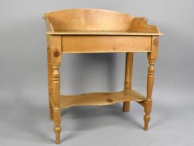 A Stripped Pine Galleried Wash Stand with Stretcher Shelf, 76cms Wide