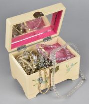 A Vintage Musical Jewellery Box Containing a Small Quantity of Jewellery