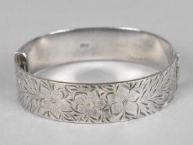 A Silver Bangle with Foliate Chased Decoration, Clasp in need of Attention, Birmingham Hallmark