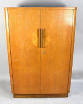 An Art Deco Fitted Gents Robe, 96cms Wide and 137cms High