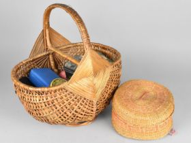 A Wicker Basket Containing Wools, Buttons Etc