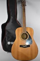 A Late 20th Century Yamaha F310 Acoustic Guitar in Canvas Carrying Bag
