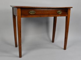 An Edwardian Mahogany Side Table with Single Long Drawer on Taperong Square Feet, 86cms Wide
