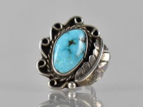 A Large Turquoise Mounted Navajo Ring in Unmarked White Metal, Irregular Turquoise Cabochon